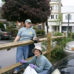 Pat and Sharon working on the rose bed on Rose Alley.